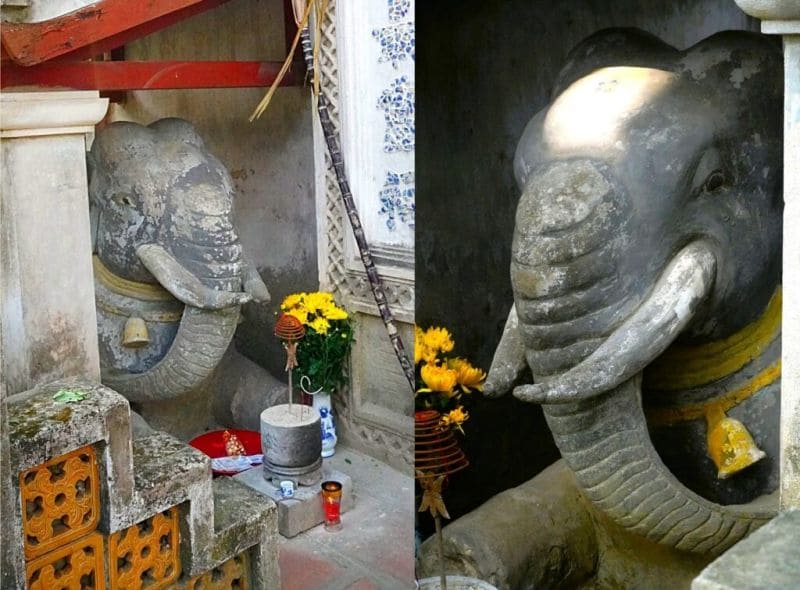Bạn nên thắp hương cho hai bức tượng voi đá quỳ phục ở cổng ngoài sau đó mới tiến vào bên trong